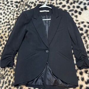 Black three-quarter length sleeved blazer
